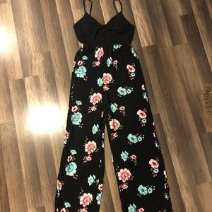 Black and Floral jumpsuit size lg